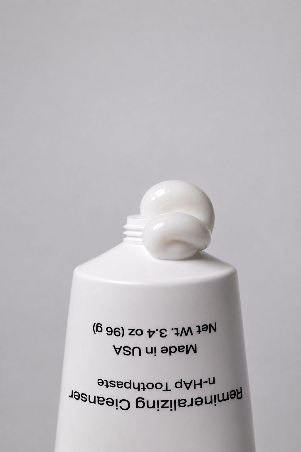 Salo Remineralizing Cleanser paste on the tube nozzle